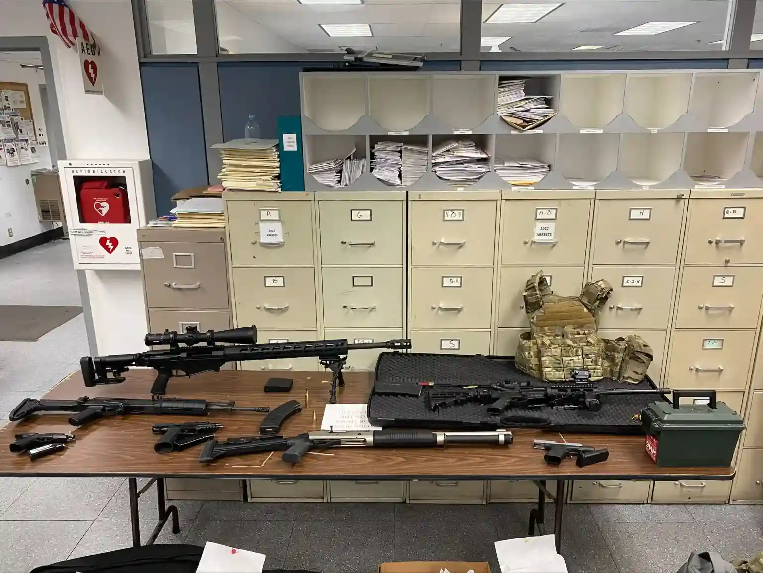 Police shared a picture of the seized illegal firearms found in Johnson's apartment.