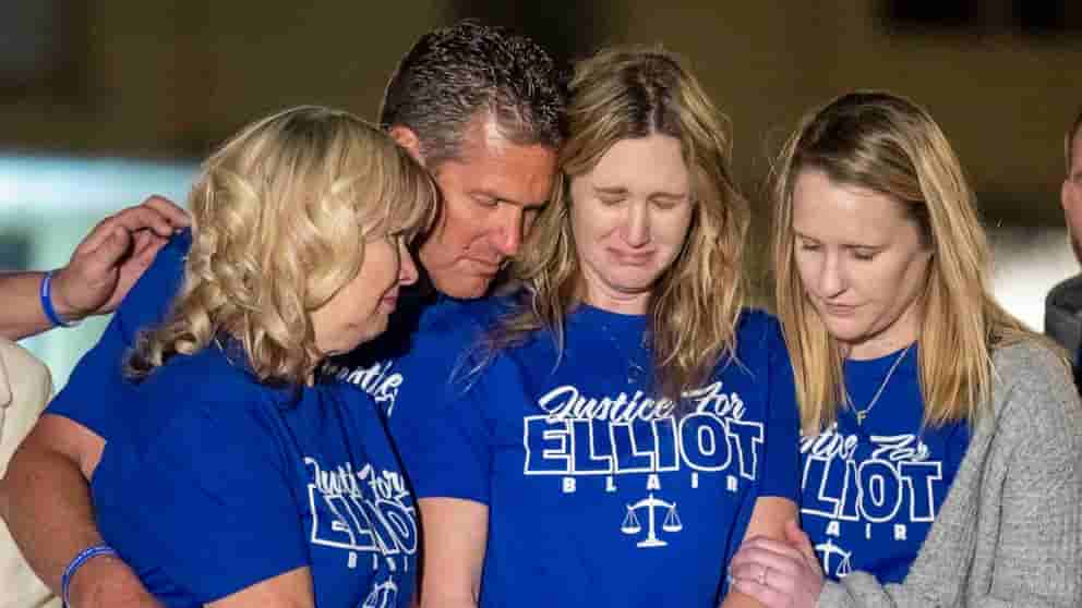 Kimberly Williams, second from right, the wife of Elliot Blair, is comforted by her family during a candlelight vigil in Orange, Calif., Jan 26, 2023, for Orange County deputy public defender Elliot Blair who died i...Show more MediaNews Group/Orange County Register via Getty Images