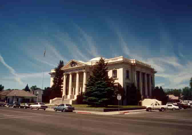 A district judge in Elko sentenced a former Nevada bank teller to six years in prison after exploiting a handicapped woman she befriended.